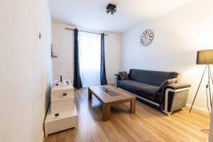 Appartements appart cosy,calme a 2 pas du centre de montbrison : photos des chambres