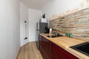 Appartements appart cosy,calme a 2 pas du centre de montbrison : photos des chambres