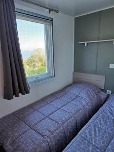 Campings Mobilhomme LECCI 3 CHAMBRES AVEC VUE MER EXCEPTIONNELLE : photos des chambres