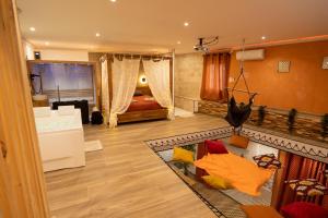 Maisons de vacances Capsule Marrakech I Chicha I Sauna I Balneo I Console PS5 I Cinema : photos des chambres