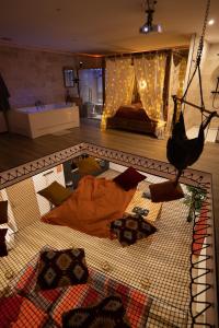 Maisons de vacances Capsule Marrakech I Chicha I Sauna I Balneo I Console PS5 I Cinema : photos des chambres