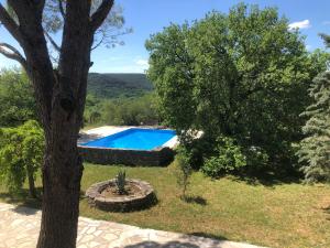 Maisons d'hotes Mas de Bombequiols : Chambre Double ou Lits Jumeaux - Vue sur Jardin