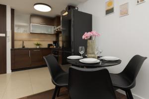 Family Apartment near PGE Narodowy by Renters