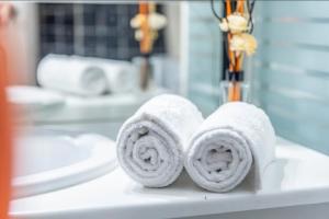 Appartements LE SEVENTIE'S 3 Terrasse-Netflix-Wifi-Parking-Mer-TOP PROS SERVICESConciergerie : photos des chambres