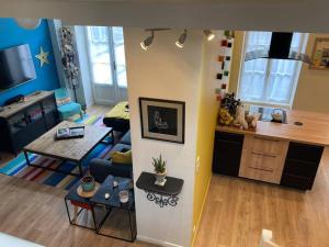 Appartements Les Lices : photos des chambres