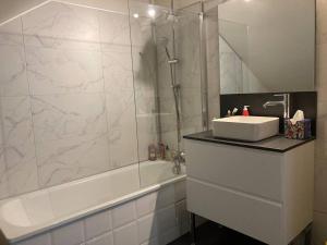 Appartements Les Lices : photos des chambres