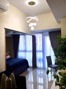 New & Modern Cozy 1BR w Balcony@BGC, WiFi 300MBPS