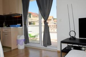 Apartments by the sea Marina, Trogir - 10327