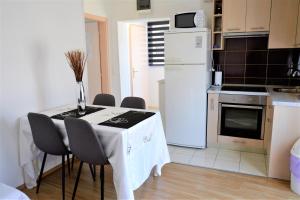 Apartments by the sea Marina, Trogir - 10327