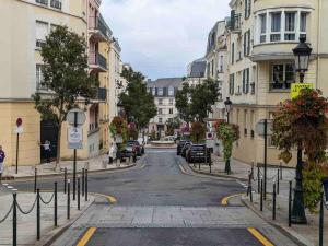 Appartements Le Plessis Capitale - Appartement entier avec jardin : photos des chambres