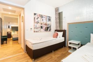 Comfort Quadruple Room room in Hotel Memories Budapest