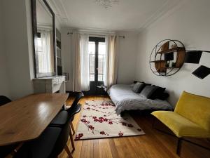 Appartements superbe appartement belifontain coeur de ville : photos des chambres
