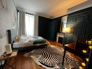 Appartements superbe appartement belifontain coeur de ville : photos des chambres