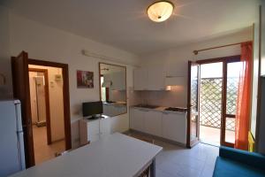 Bilocale SABBIA 3 - Zona mare con terrazza, clima e posta auto