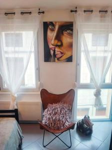 Appartements chez Arty - Gere par Presta-Zen'Services : photos des chambres