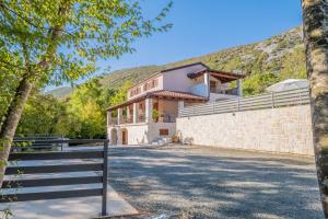 Traditional poolside villa surrounded by nature in Tribalj