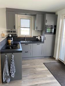 Vakantiehuis T Koetshuis