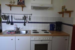 Ferienwohnung OG im roten Haus am Ostsee Radweg OVS 103