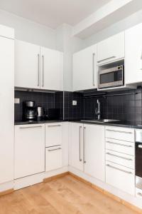 2ndhomes Stylish 1BR home with Balcony and Sauna in Kamppi Center