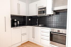 2ndhomes Stylish 1BR home with Balcony and Sauna in Kamppi Center