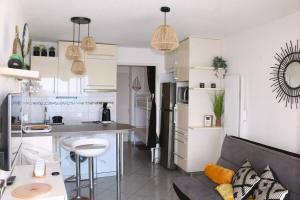 Appartements T1 Cabine 4 couchages vue mer ! : photos des chambres