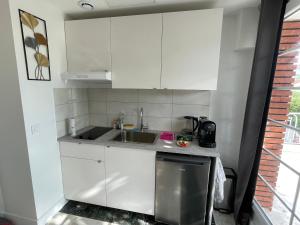 Appartements Joli T2, Terrasse et Jardin, Ideal pour familles, a 15 min de l'aeroport Roissy CDG : photos des chambres