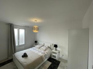 Appartements Joli T2, Terrasse et Jardin, Ideal pour familles, a 15 min de l'aeroport Roissy CDG : photos des chambres