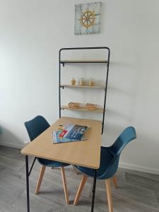 Appartements LE KENAV - STUDIO A 300 M DU PORT : photos des chambres