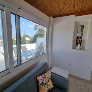 Arocaria Apartment in Faliraki with garden , mountain and sea view