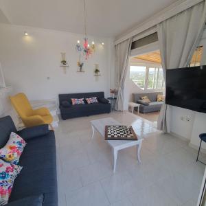 Arocaria Apartment in Faliraki with garden , mountain and sea view