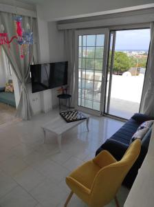 Arocaria Apartment in Faliraki with garden , mountain and sea view