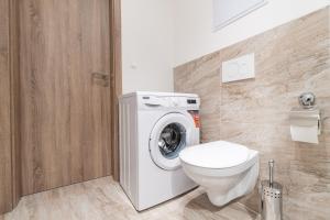 Brand new studio apartment #21 with free secure parking in the center