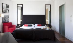 Quatro Puerta del Sol