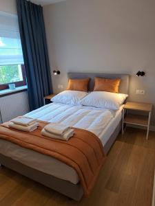 Three-Bedroom Apartment room in Pokoje Hotelowe Figaro