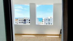 Quarteira Beach Vacation: 2BR steps to the sand