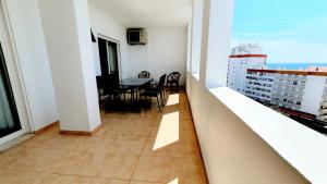 Quarteira Beach Vacation: 2BR steps to the sand