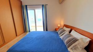 Quarteira Beach Vacation: 2BR steps to the sand