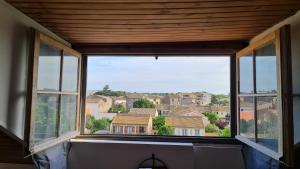 Appartements Le Cocon de la Republique T3 Mezzanine Belle vue plein Sud sans vis a vis dans une petite Residence tres calme Agde Centre : photos des chambres