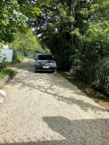 Appartements Maison avec parking et jardin - 10 min de l'aeroport - ARRIVEE AUTONOME : photos des chambres