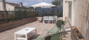 Appartements Studio avec Terrasse : photos des chambres