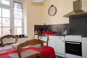 Appartements La Licorne - 1ere etage - Centre Bourg : photos des chambres