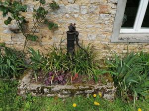 Maisons de vacances Maison renovee en pierres sejour spacieux avec jardin et terrasse amenagee pres Omaha beach & Bayeux a 5mn de la mer tous commerces : photos des chambres