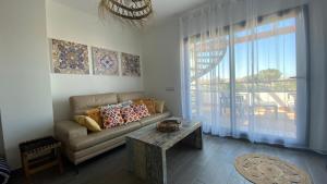 Sunny Luxury Apartment with two great sunny - level terraces, two swimming pools, in a new complex Pueblo Majorero, close to Fuerteventura Golf Club, next to the beach , Atlantico Shopping Mall and casino in Caleta de Fuste