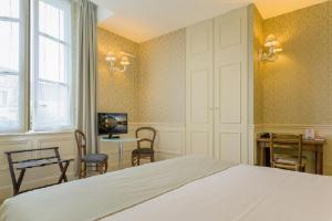 Hotels Hotel Grand Monarque : photos des chambres