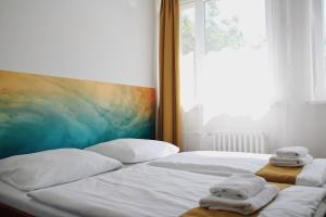 Quadruple Room with Private Bathroom room in Atlas Hotel Garni