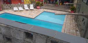 Flats no FORTE 200m praia ar piscinas até 8 pessoas portaria 24H