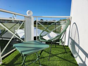 Maisons de vacances Maison Les Dunes avec piscine collective : photos des chambres