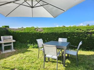 Maisons de vacances Maison Les Dunes avec piscine collective : photos des chambres