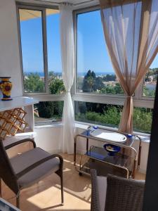 Lovely apartment in Torremolinos Views of the sea, pool, terrace, sofa bed and fully equipped kitchen