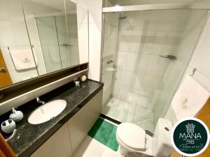 Mana Beach Flat Muro Alto